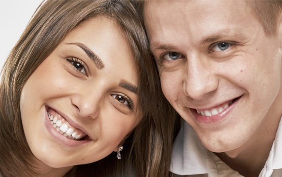 pareja sonriendo odontologia general