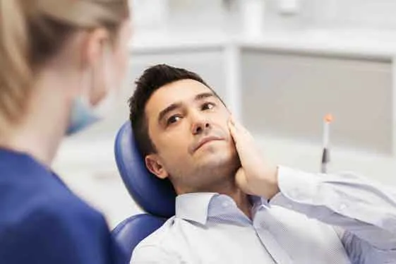 paciente-dental-con-dolor-de-muelas